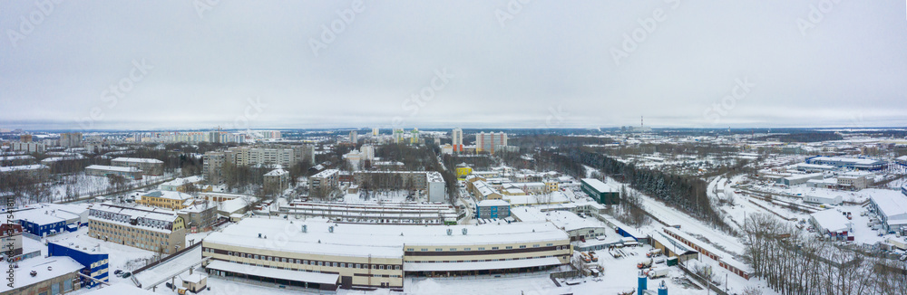 Panorama of the Kirov city and Leninsky district in the central part of the city of Kirov on a winter day from above. Russia from the drone.