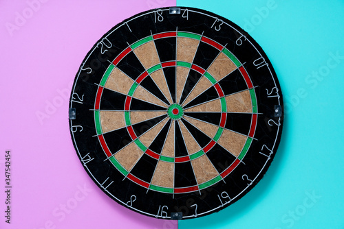 target dart board on the table, center point, head to target marketing and business success concept