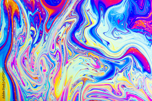 Colorful reflections on the surface of a soap bubble.
