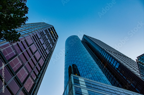 View to the tall glass buildings from the street road