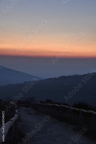 Fototapeta Naklejka Na Ścianę i Meble -  the Euganean hills at sunset time in winter with a glass