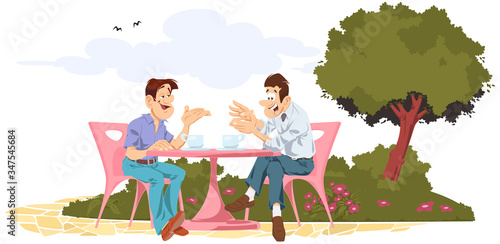 Friends are talking at table in cafe. Funny people.