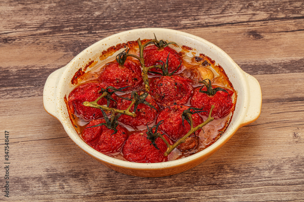 Baked cherry tomatoes with oil Baked cherry tomatoes with oil