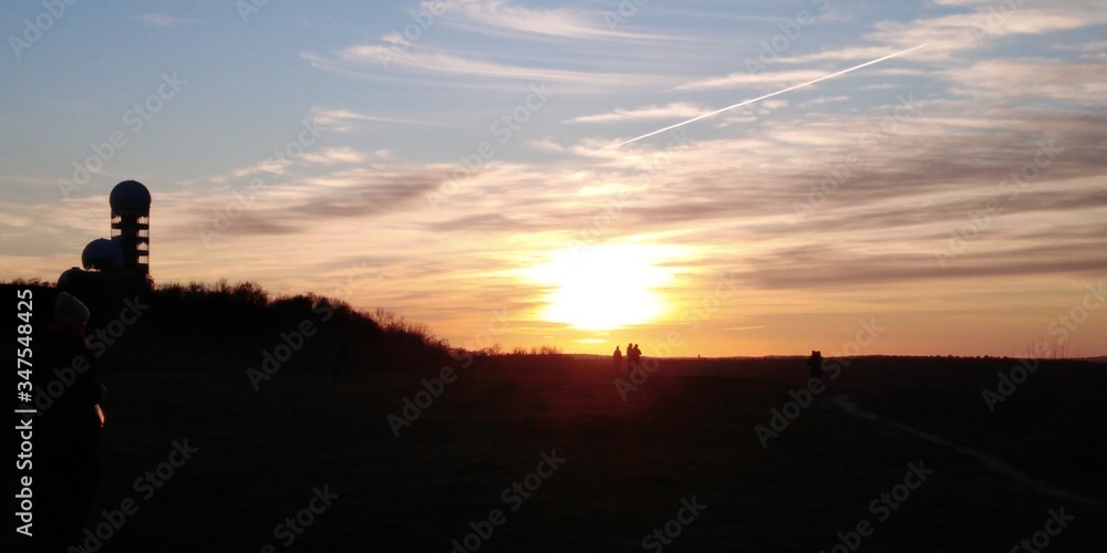 Fototapeta premium silhouette of a man walking on the sunset