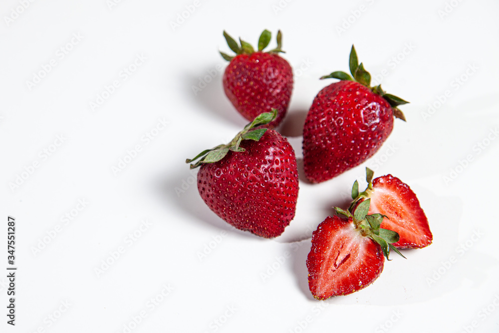 strawberries on a white table strawberries on a white table