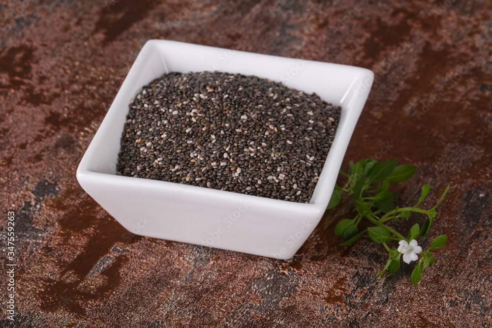 Dietary Chia seeds in the bowl Dietary Chia seeds in the bowl