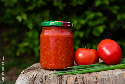 Canned tomato sauce in a jar