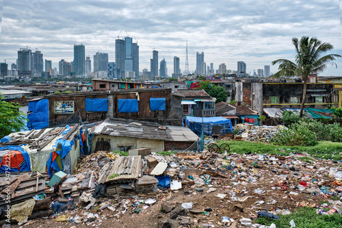 View of Mumbai skyline with skyscrapers over slums in Bandra suburb. Mumbai, Maharashtra, India