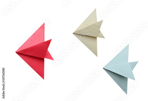 Colorful origami fishes isolated white