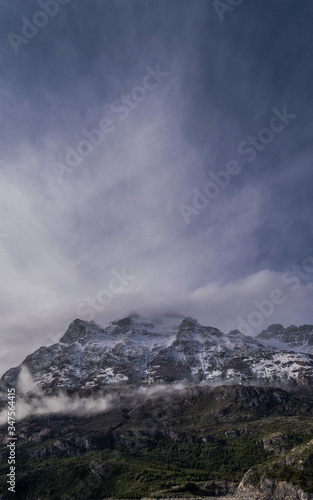 clouds over huge mountains