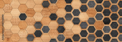 Natural wood texture for background. Parquet floor with hexagonal pattern. 