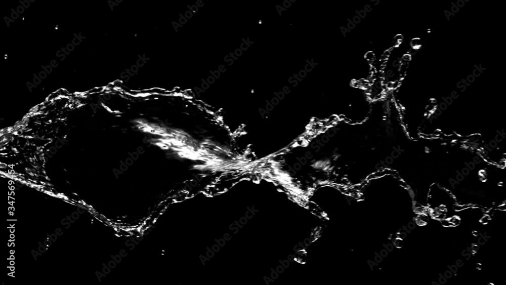 Super Slow Motion Shot of Swirling and Splashing Water Isolated on Black Background at 1000fps. Super Slow Motion Shot of Swirling and Splashing Water Isolated on Black Background at 1000fps.
