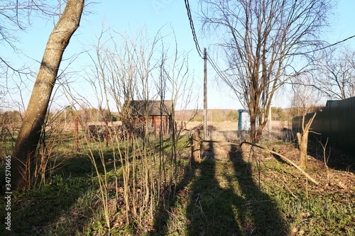 Fototapeta Naklejka Na Ścianę i Meble -  cottage plot in spring in the village