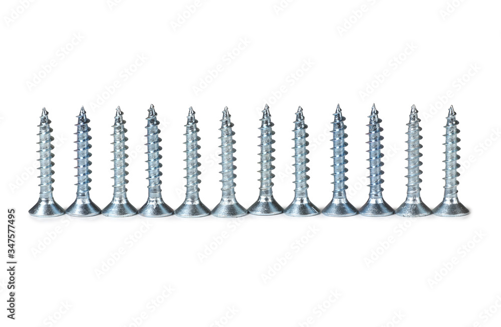 Screw and screwdrivers for construction work on a white background Screw and screwdrivers for construction work on a white background