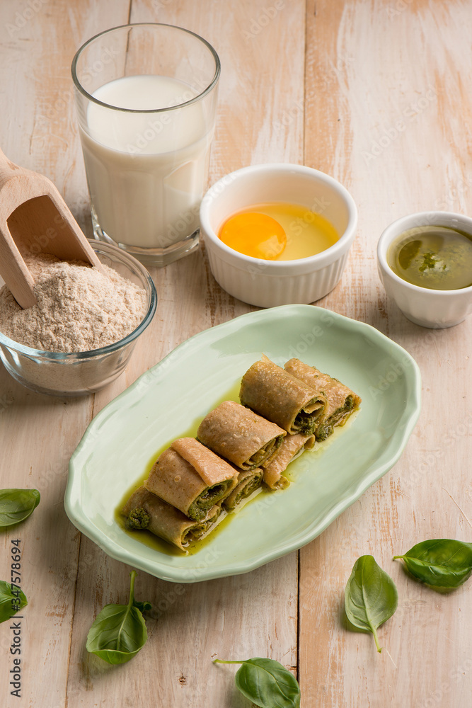 crepes with pesto sauce and ingredients crepes with pesto sauce and ingredients