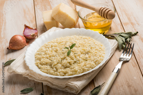 Obraz na płótnie Risotto with sage honey and parmesan cheese
