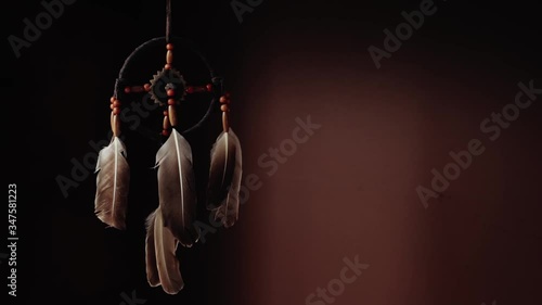 Traditional dreamcatcher in empty space with natural light