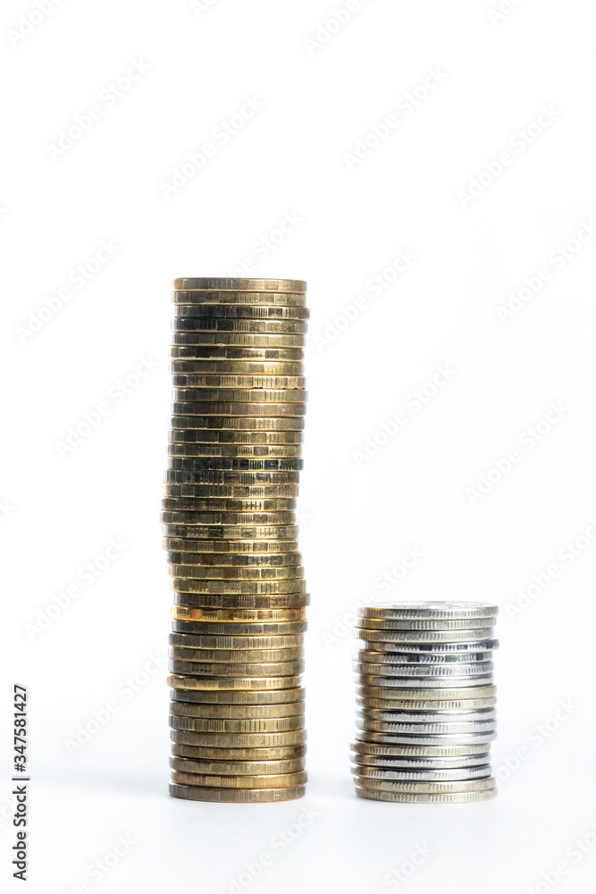High and low bars of coins stacked High and low bars of coins stacked