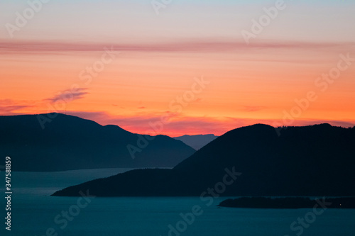 Sunset behind the San Juan Islands of Puget Sound in Washington photo