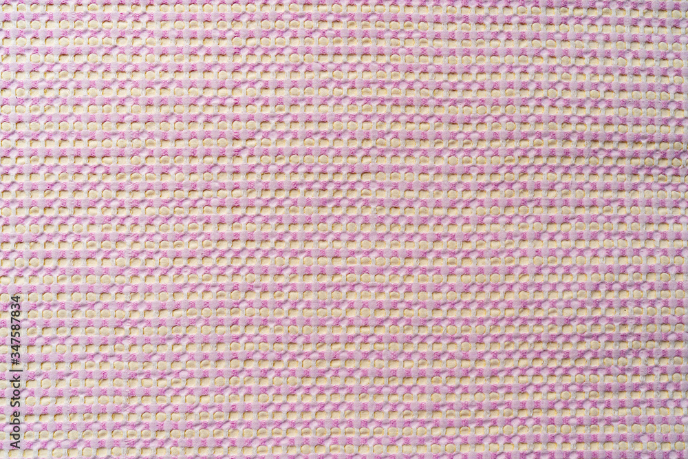 Fototapeta premium Pink fabric with dots. Fabric texture background