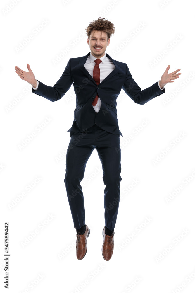 Cheerful businessman laughing with his hands open Cheerful businessman laughing with his hands open