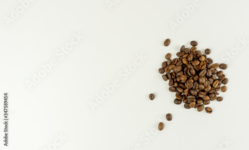 Coffee beans on a white background. place for text. Top view. Flat lay. Mockup