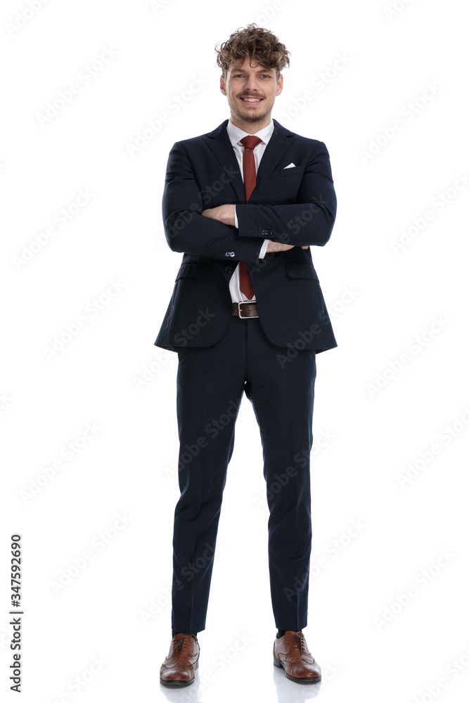 Happy businessman laughing with his arms crossed Happy businessman laughing with his arms crossed