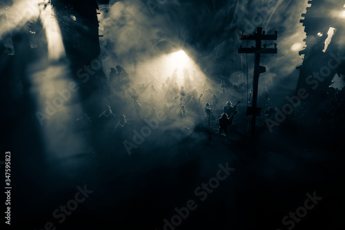 War Concept. Military silhouettes fighting scene on war fog sky background, World War Soldiers Silhouette Below Cloudy Skyline At night. photo