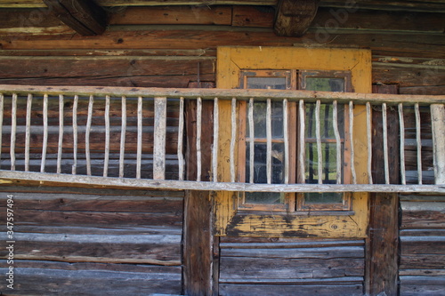 Window and ladder in Log cabin in Nizna Boca village and municipality in Liptovsky Mikulas district, central Slovakia
