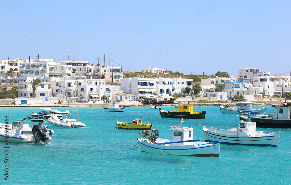 scenery of Ano Koufonisi island Cyclades Greece - traditional fishing boats at the harbor
