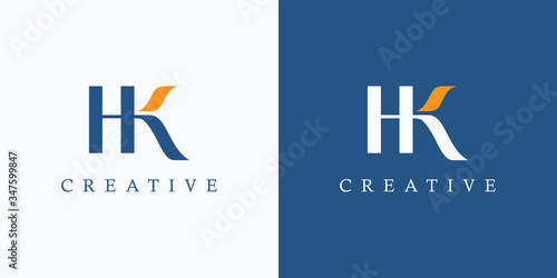 Initial Letter H and K Linked Logo. Blue and Yellow Lettering Calligraphy Style. Usable for Business, Beauty and Fashion Logos. Flat Vector Logo Design Template Element.