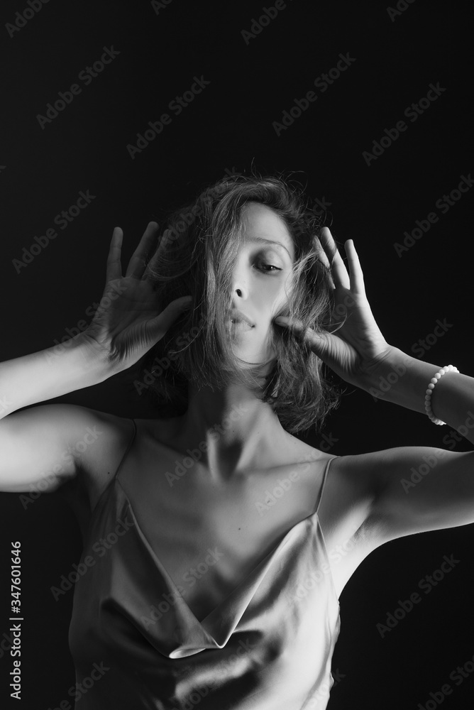 Portrait of a beautiful, sexy girl. Black and white art photo. The concept of beauty and youth Portrait of a beautiful, sexy girl. Black and white art photo. The concept of beauty and youth