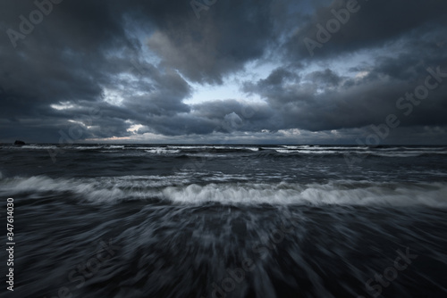Photography Storm clouds above the Baltic sea in winter, long exposure