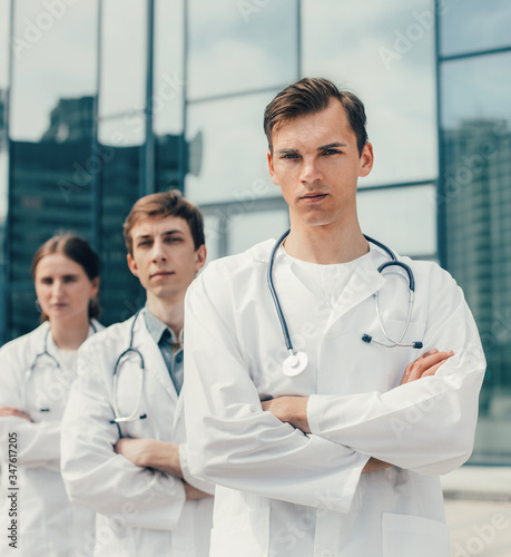 close up. team of doctors standing on a city street.