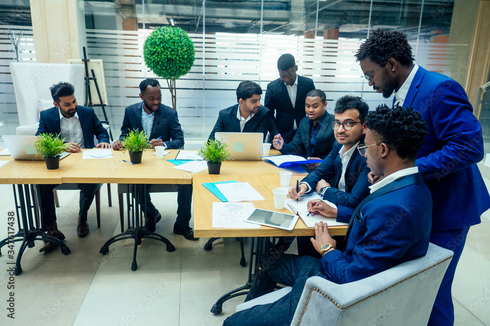 international business company of nine african american and indian people developing a strategy of ecology building modern office international business company of nine african american and indian people developing a strategy of ecology building modern office