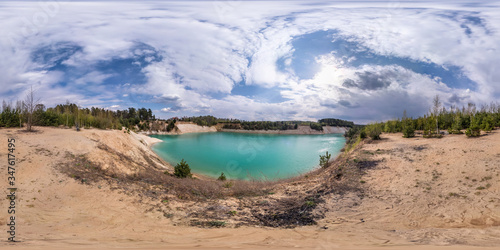 full seamless spherical hdri panorama 360 degrees angle view on limestone coast of huge green lake for sand extraction old mining with beautiful clouds in equirectangular projection, VR content