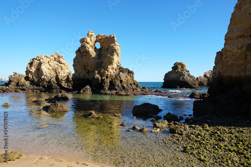  beautiful beach and coastline in the Algarve with turquoise waters 