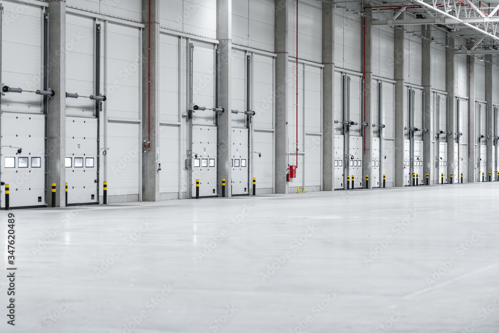 Empty loading docks at the logistics center from inside