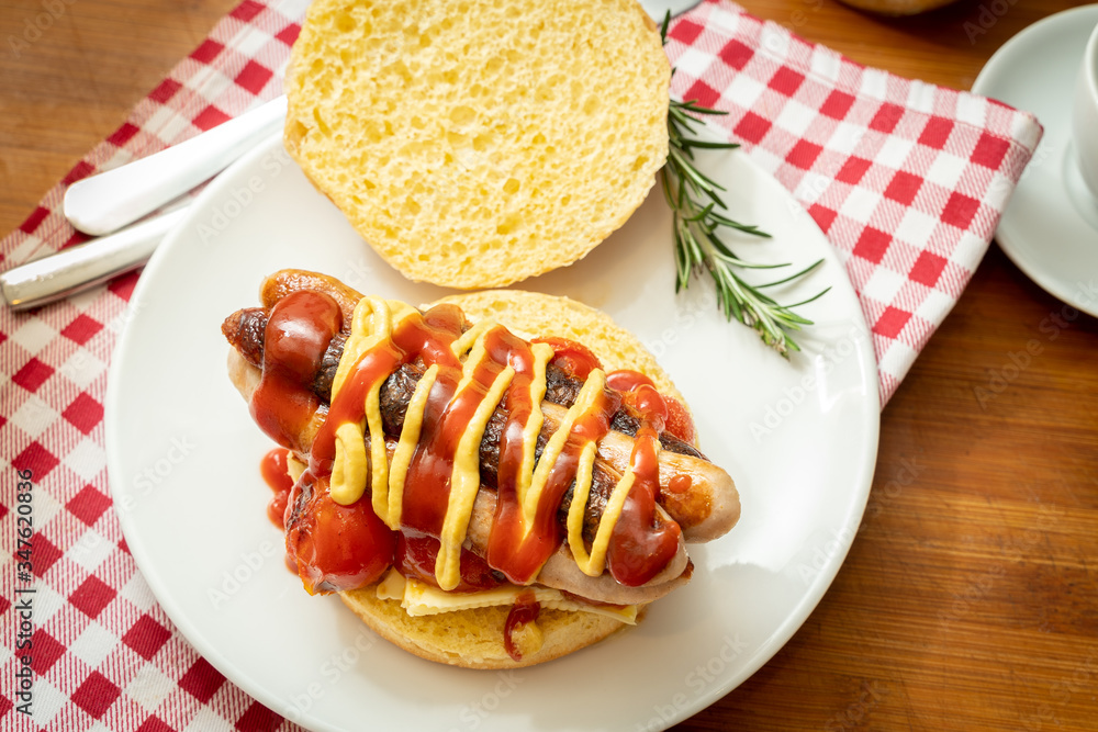 overhead shot of fried breakfast American sausage egg tomatoes roll coffee quick tasty first healthy big portion