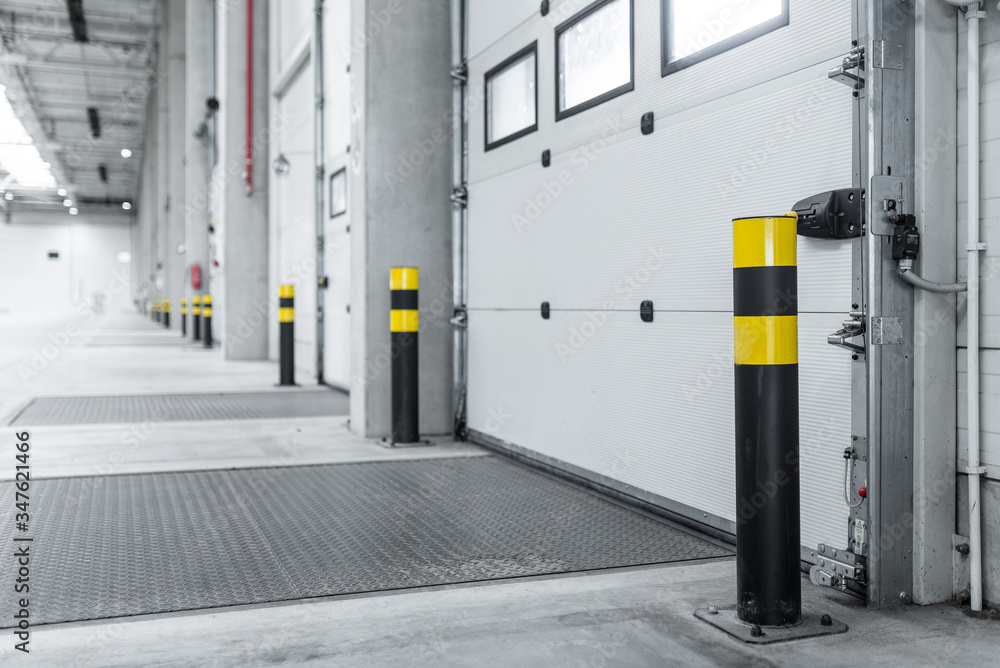 Empty loading docks at the logistics center from inside