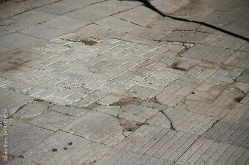Old ugly broken paving slabs