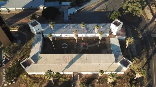 4K aerial drone summer sunset video of Windhoek old vintage Alte Feste Old Fort in city center in Namibia's capital in central highland of Namibia, southern Africa