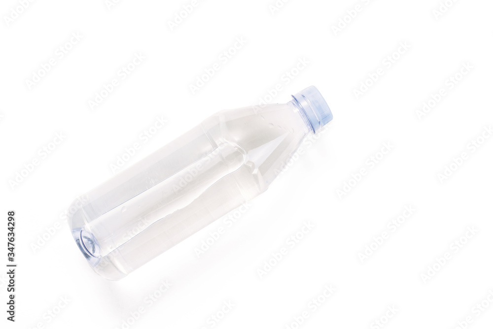 plastic bottle with a sparkle of water on a white background. Copyspace, place for text plastic bottle with a sparkle of water on a white background. Copyspace, place for text