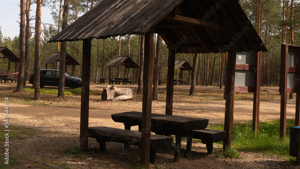 
Wooden picnic houses in the Gor Sokolich reserve in Olsztyn. Free space for an inscription