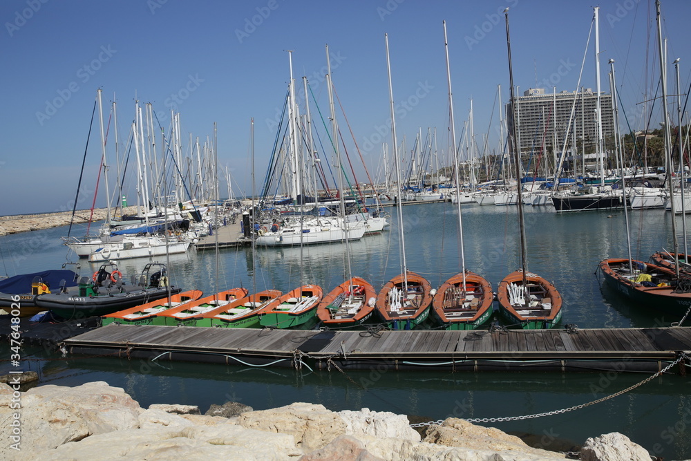 Obraz premium orange training yachts in a yacht marina in the Mediterranean.