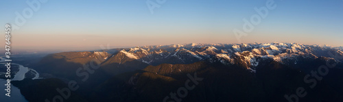 Aerial Panoramic View of Canadian Mountain Landscape during sunny sunrise. Located near Vancouver, British Columbia, Canada. Nature Panorama Background