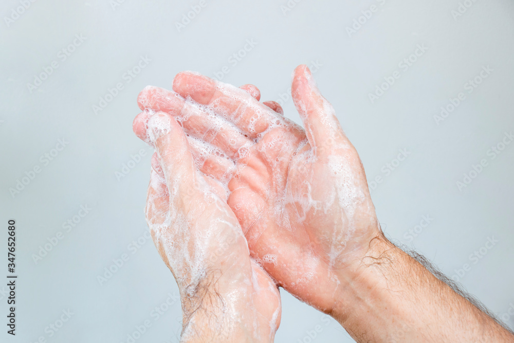 Washing hands rubbing with soap man for coronavirus, hygiene and desinfecton for prevention. Lock down, covid19. Antibacterial. Alcohol gel Washing hands rubbing with soap man for coronavirus, hygiene and desinfecton for prevention. Lock down, covid19. Antibacterial. Alcohol gel