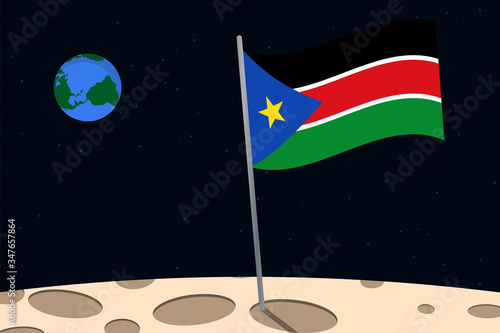 View of planet Earth from the surface of the Moon with the South Sudan flag and holes on the ground