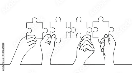 Continuous line drawing of hands solving Two Puzzle Pieces. Concept of business teamwork and integration with puzzle. Teamwork and partnership concept of two businessman isolated on white background. photo