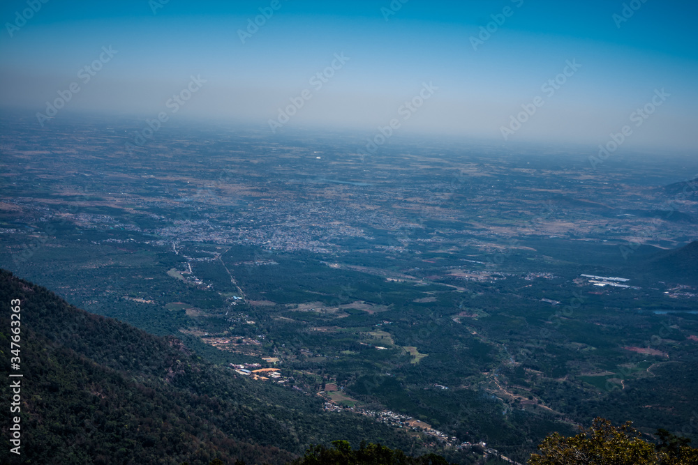 Ooty city aerial view, Ooty (Udhagamandalam) is a resort town in the Western Ghats mountains, in India's Tamil Nadu state.
